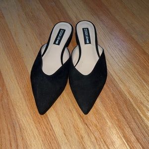 Black pointed toe mules